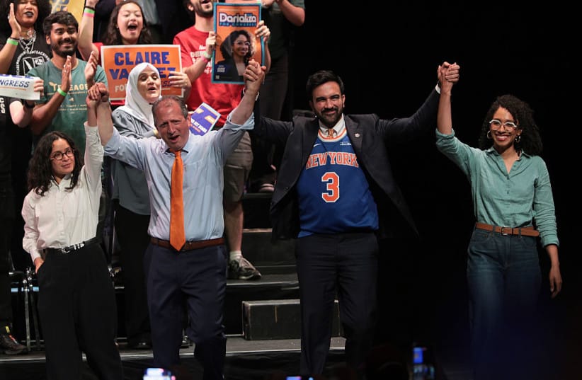 CONGRESSIONAL CANDIDATE Claire Valdez, Congressional candidate Brad Lander, Mayor Zohran Mamdani, and Congressional candidate Darializa Avila Chevalier raise their hands during a Get Out the Vote (GOTV) rally at King's Theater on June 18, 2026 in New York City.