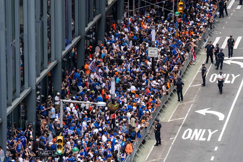 Thousands of fans line Broadway in lower Manhattan for the New York Knicks Championship ticker tape parade and victory rally (Getty Images)