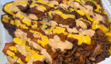 This Massive NYC Halal Platter Is Piled So High It Defies Gravity