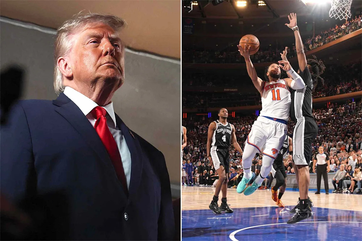 Donald Trump reacts to New York Knicks fans loudly booing him in the room at NBA Finals