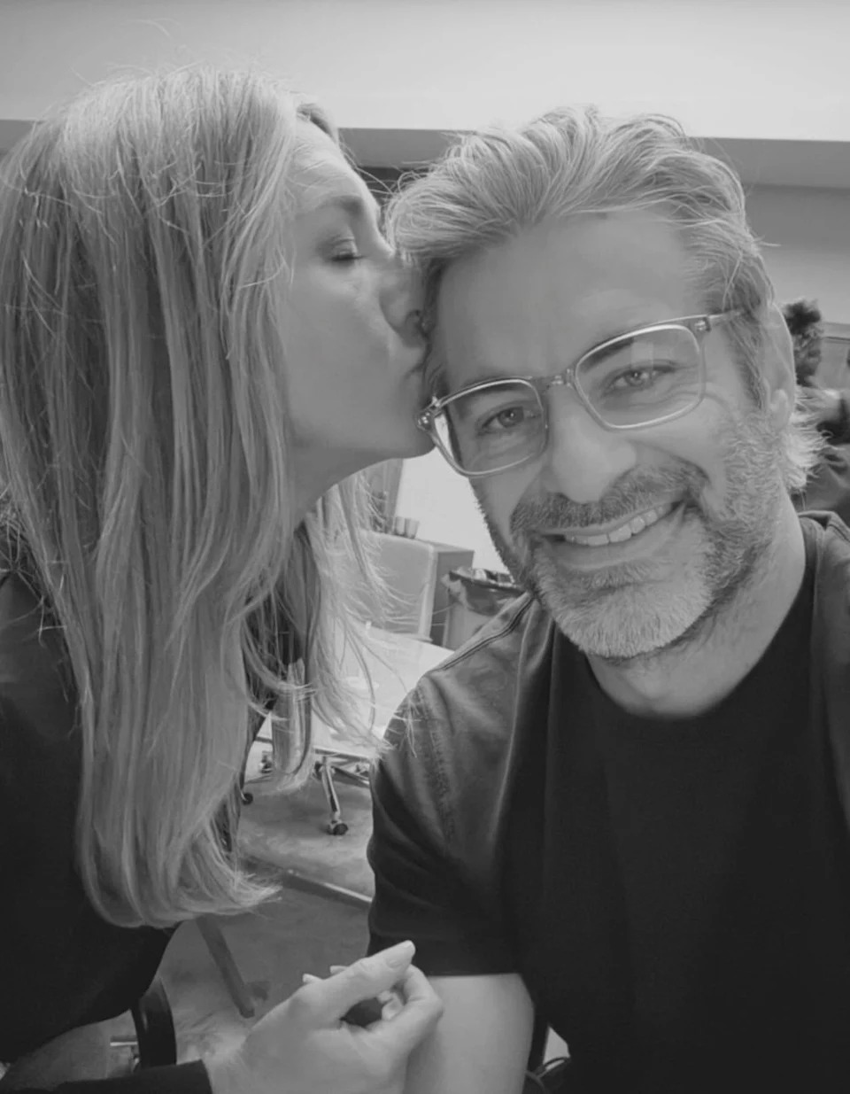 Jennifer Aniston poses for a photo with her boyfriend, Jim Curtis
