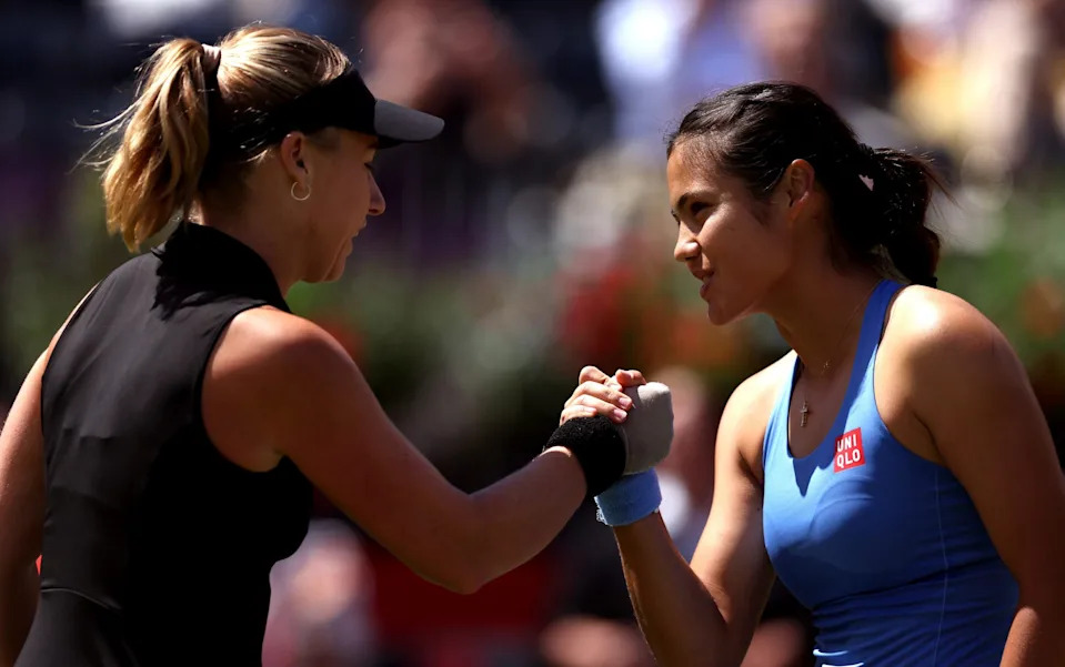 Raducanu and Blinkova shake hands after their first-round match at Queen's