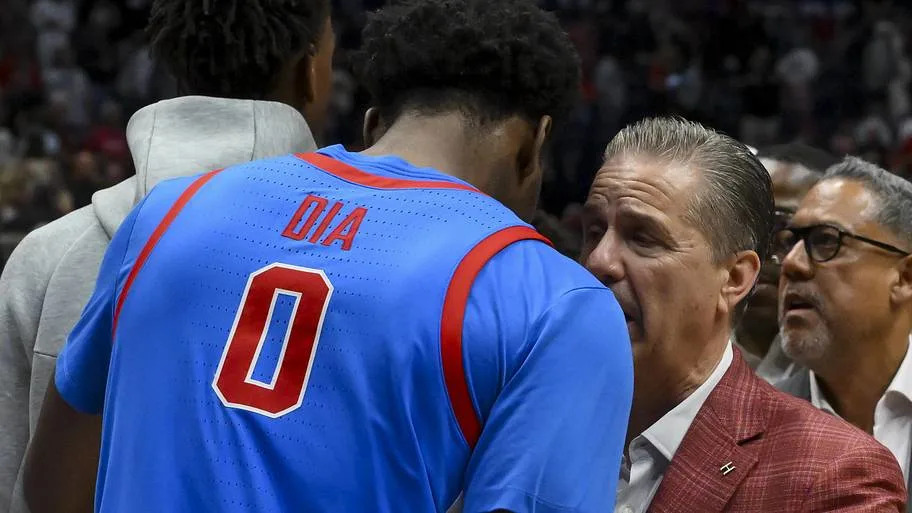 Arkansas Razorbacks head coach John Calipari talks with Mississippi Rebels forward Malik Dia. Steve Roberts-Imagn Images
