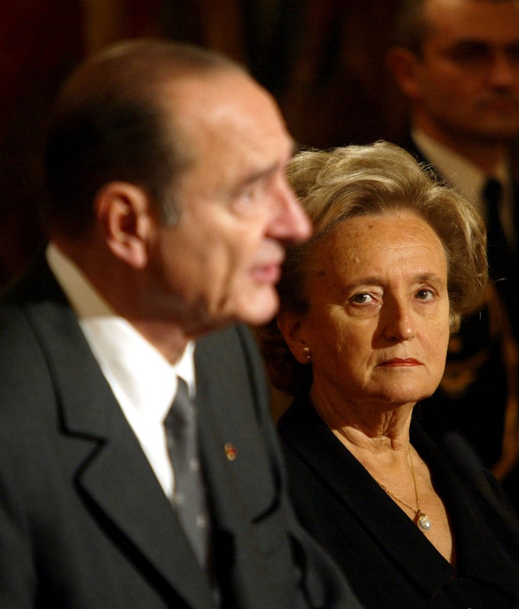 Bernadette Chirac looks on as her husband, French President Jacques Chirac, speaks in Paris in December 2001. Photo: AFP