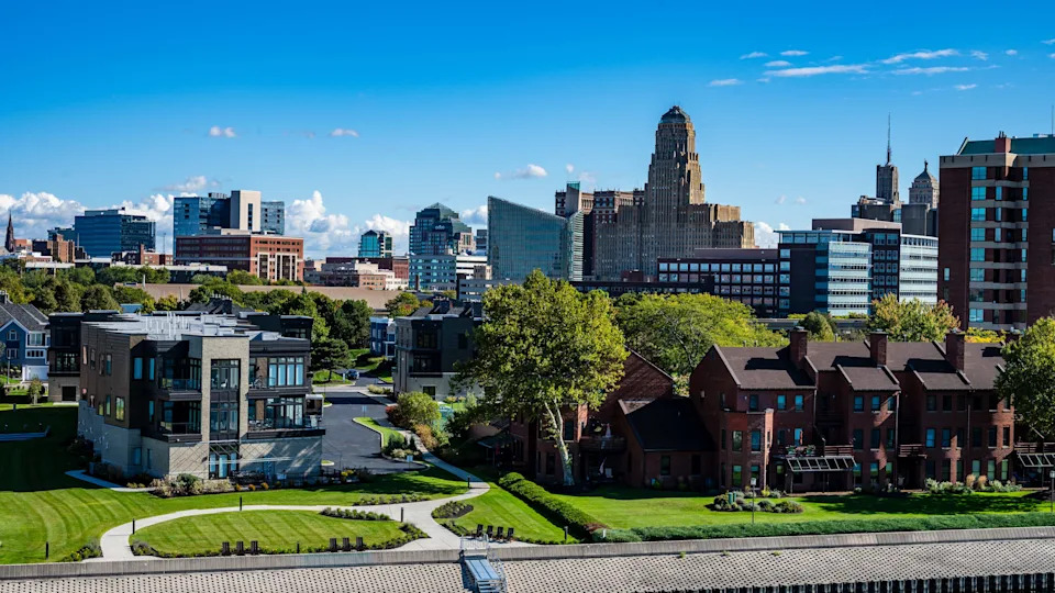 The Buffalo New York skyline in summer, with buildings of varying sizes