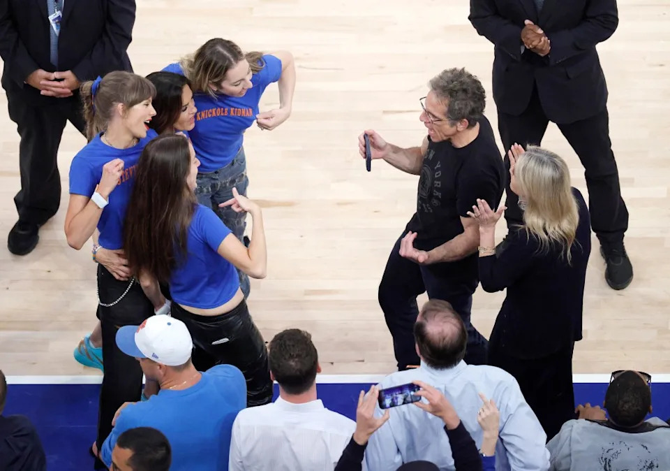 Taylor Swift and actress Mariska Hargitay react on celebrity row with Ben Stiller nd his wife Christine Taylor during the fourth quarter. Jason Szenes for the New York Post