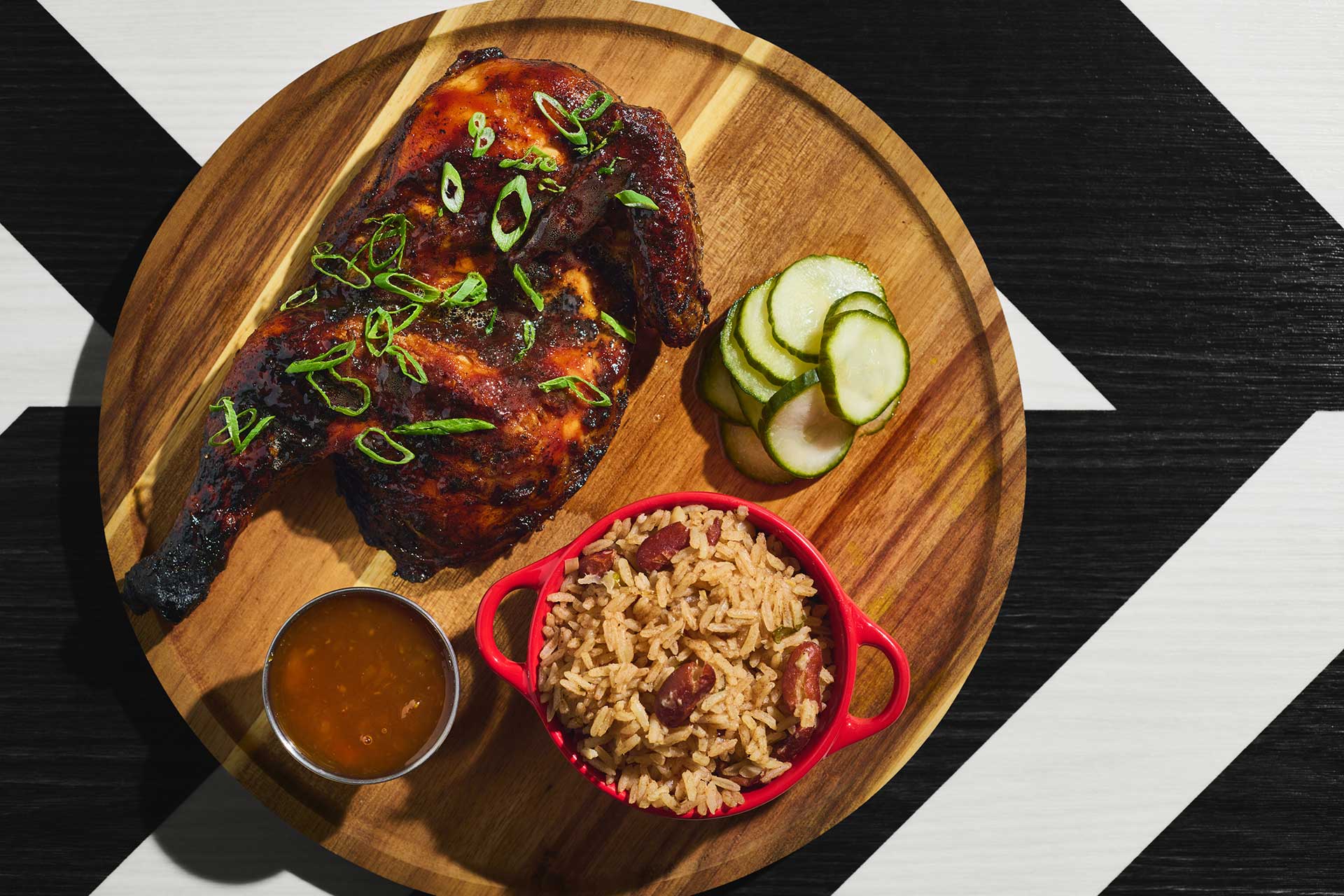 Jerk chicken is a Jamaican staple and a popular order at Miss Lily's. © Michael Condran