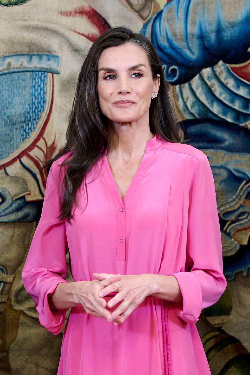Queen Letizia swaps her papal white looks for a striking oversized pink dress and Spanish espadrilles