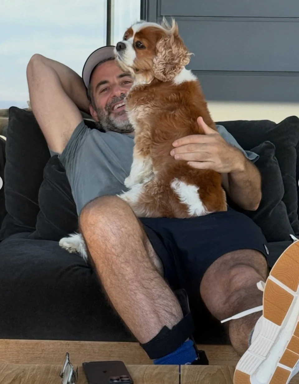 Jennifer Aniston's boyfriend Jim Curtis poses with her dog