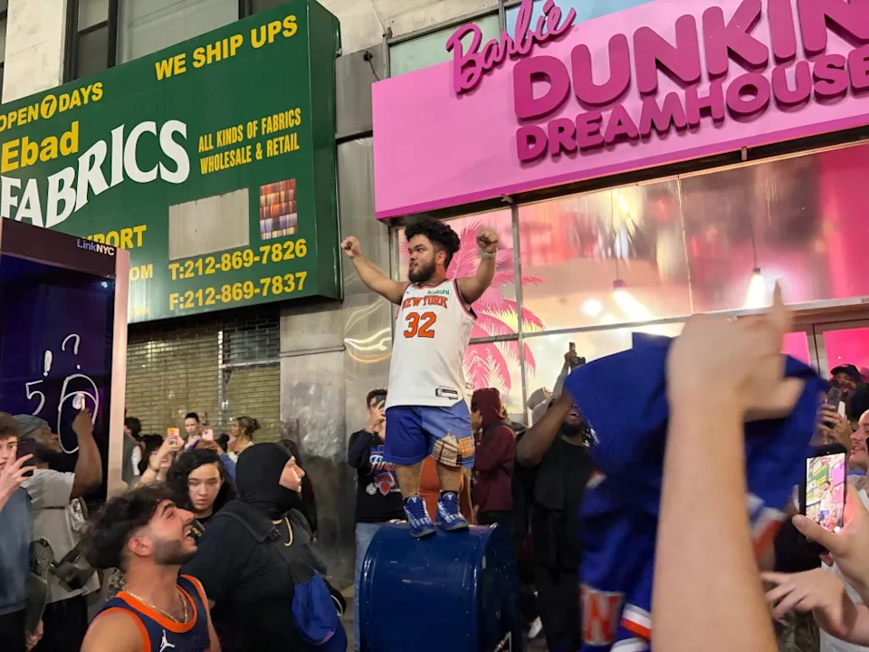 Fans celebrate at Herald Square after the Knicks’ historic comeback. Jennifer Bain
