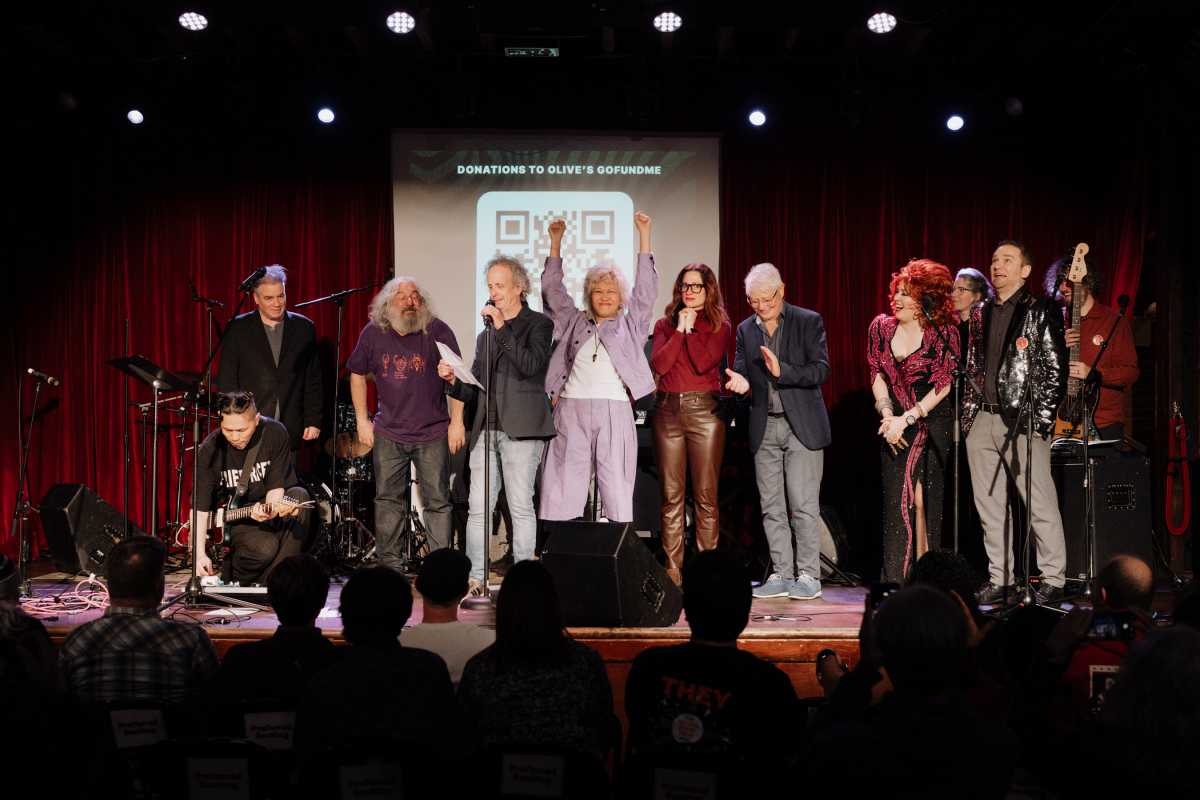 The lineup of PineappleFest on stage with Olive.