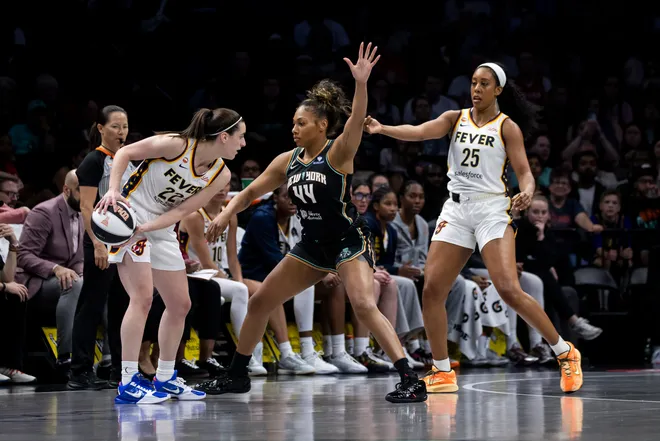 NEW YORK, NEW YORK - JUNE 6: Betnijah Laney-Hamilton #44 of the New York Liberty defends against Caitlin Clark #22 of the Indiana Fever at Barclays Center on June 6, 2026, in New York City. NOTE TO USER: User expressly acknowledges and agrees that, by downloading and/or using this Photograph, User is consenting to the terms and conditions of the Getty Images License Agreement. (Photo by Michelle Farsi/Getty Images)