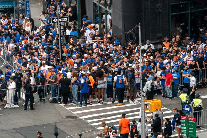 NEW YORK, NEW YORK - JUNE 18: Thousands of fans gather in lower Manhattan for the New York Knicks Championship ticker tape parade and victory rally celebrating winning the 2026 NBA Finals on June 18, 2026 in New York City. The New York Knicks defeated the San Antonio Spurs in five games to win their first NBA Championship in 53 years.