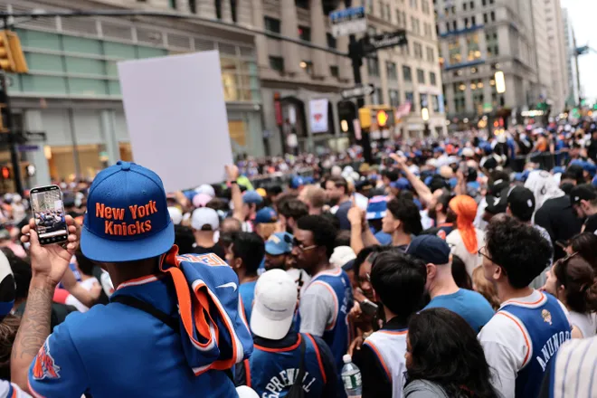 NEW YORK, NEW YORK - JUNE 18: Fans line up ahead of the New York Knicks Championship ticker tape parade and victory rally celebrating winning the 2026 NBA Finals on June 18, 2026 in New York City. The New York Knicks defeated the San Antonio Spurs in five games to win their first NBA Championship in 53 years.