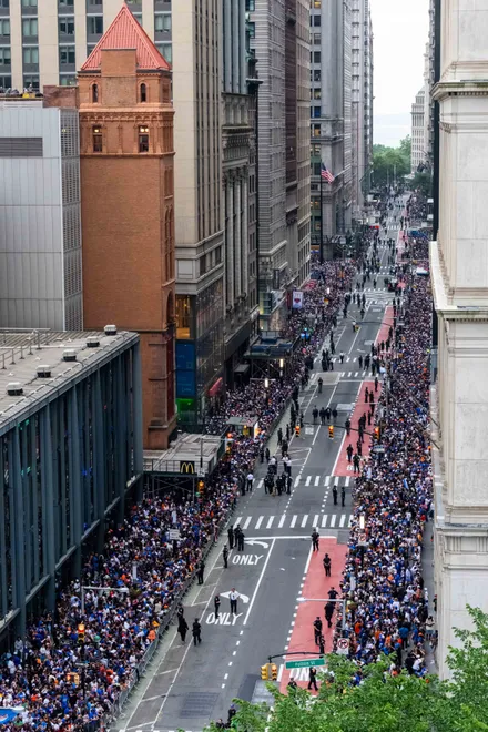 NEW YORK, NEW YORK - JUNE 18: Thousands of fans line Broadway for the New York Knicks Championship ticker tape parade and victory rally celebrating winning the 2026 NBA Finals on June 18, 2026 in New York City. The New York Knicks defeated the San Antonio Spurs in five games to win their first NBA Championship in 53 years.
