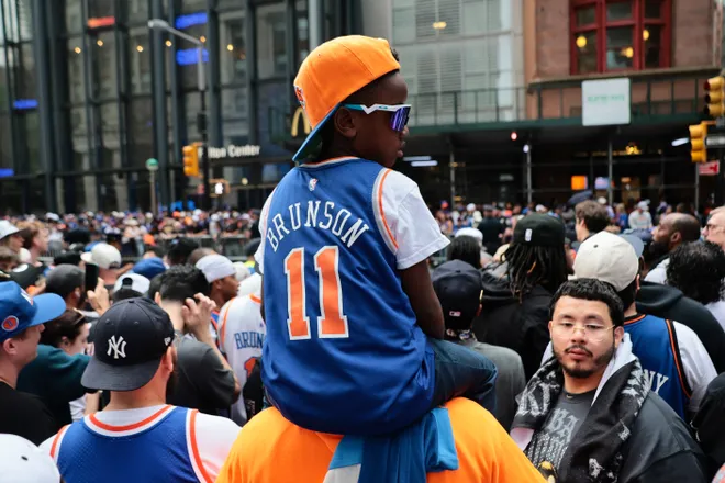NEW YORK, NEW YORK - JUNE 18: Fans arrive ahead of the New York Knicks Championship ticker tape parade and victory rally celebrating winning the 2026 NBA Finals on June 18, 2026 in New York City. The New York Knicks defeated the San Antonio Spurs in five games to win their first NBA Championship in 53 years.