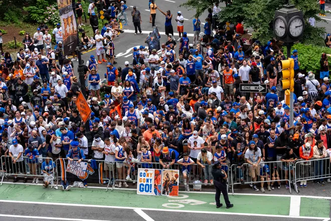 NEW YORK, NEW YORK - JUNE 18: Thousands of fans line Broadway in lower Manhattan for the New York Knicks Championship ticker tape parade and victory rally celebrating winning the 2026 NBA Finals on June 18, 2026 in New York City. The New York Knicks defeated the San Antonio Spurs in five games to win their first NBA Championship in 53 years.