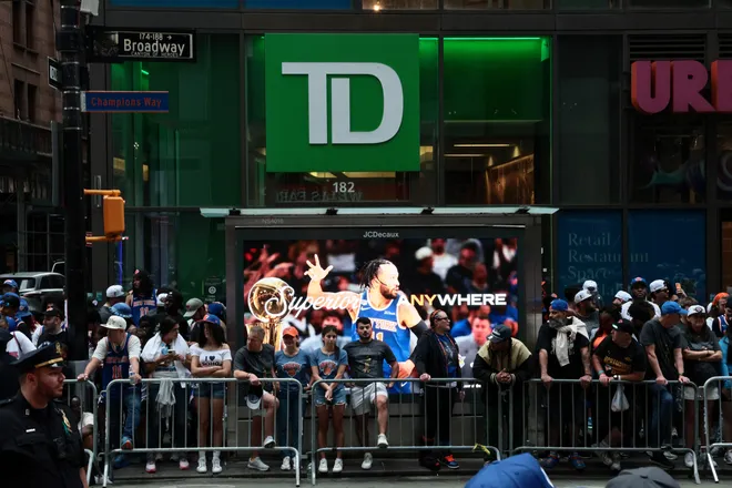 NEW YORK, NEW YORK - JUNE 18: Fans line up ahead of the New York Knicks Championship ticker tape parade and victory rally celebrating winning the 2026 NBA Finals on June 18, 2026 in New York City. The New York Knicks defeated the San Antonio Spurs in five games to win their first NBA Championship in 53 years.