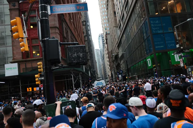 NEW YORK, NEW YORK - JUNE 18: Fans line up ahead of the New York Knicks Championship ticker tape parade and victory rally celebrating winning the 2026 NBA Finals on June 18, 2026 in New York City. The New York Knicks defeated the San Antonio Spurs in five games to win their first NBA Championship in 53 years.