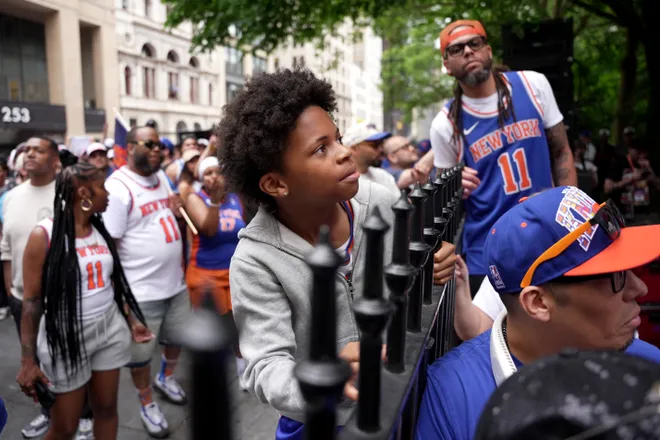 NEW YORK, NEW YORK - JUNE 18: Fans look on during the New York Knicks Championship ticker tape parade and victory rally celebrating winning the 2026 NBA Finals on June 18, 2026 in New York City. The New York Knicks defeated the San Antonio Spurs in five games to win their first NBA Championship in 53 years.
