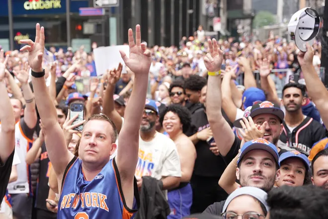 NEW YORK, NEW YORK - JUNE 18: Fans look on during the New York Knicks Championship ticker tape parade and victory rally celebrating winning the 2026 NBA Finals on June 18, 2026 in New York City. The New York Knicks defeated the San Antonio Spurs in five games to win their first NBA Championship in 53 years.