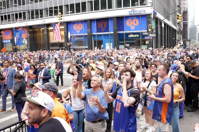 NEW YORK, NEW YORK - JUNE 18: Fans look on during the New York Knicks Championship ticker tape parade and victory rally celebrating winning the 2026 NBA Finals on June 18, 2026 in New York City. The New York Knicks defeated the San Antonio Spurs in five games to win their first NBA Championship in 53 years.