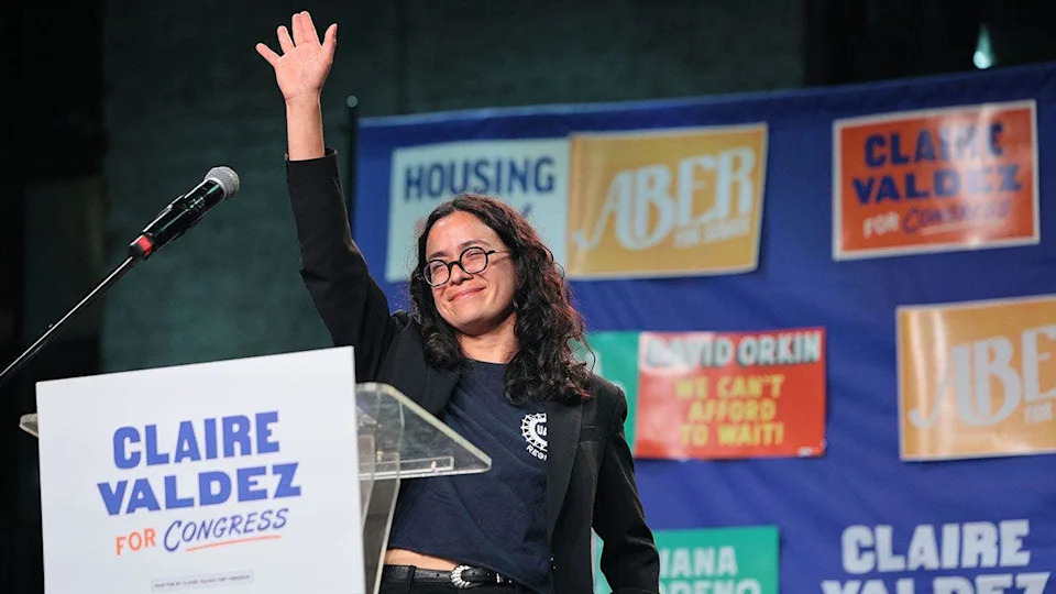 Congressional candidate Claire Valdez acknowledges supporters at a primary-night watch party in Brooklyn
