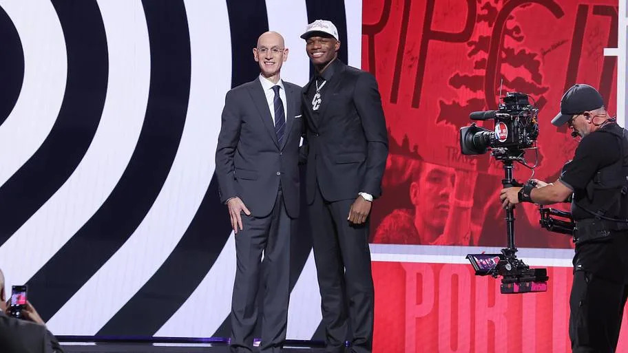 Cedric Coward stands with Adam Silver after being drafted in the first round of the 2025 NBA Draft.