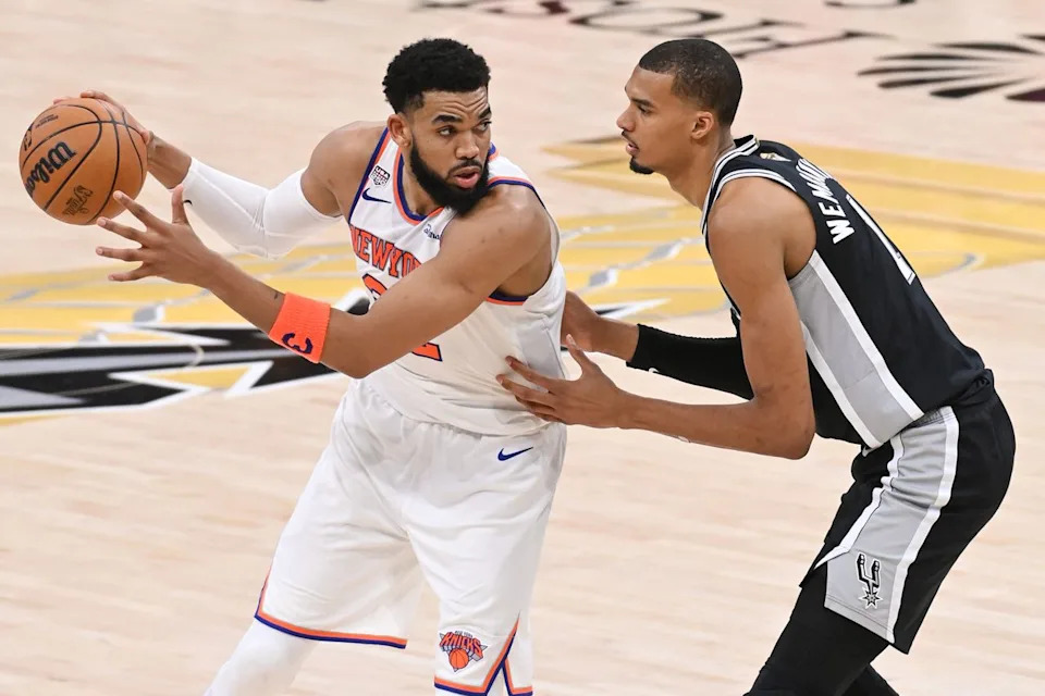 Karl-Anthony Towns (L) and Victor Wembanyama (R) during the NBA Finals on June 3, 2026Credit: Juan Ocampo/NBAE via Getty