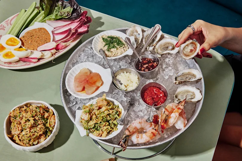 A table with oysters on ice.