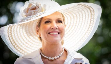 Queen Máxima embraces soft pink satin and suede with floral-inspired jewelry in London