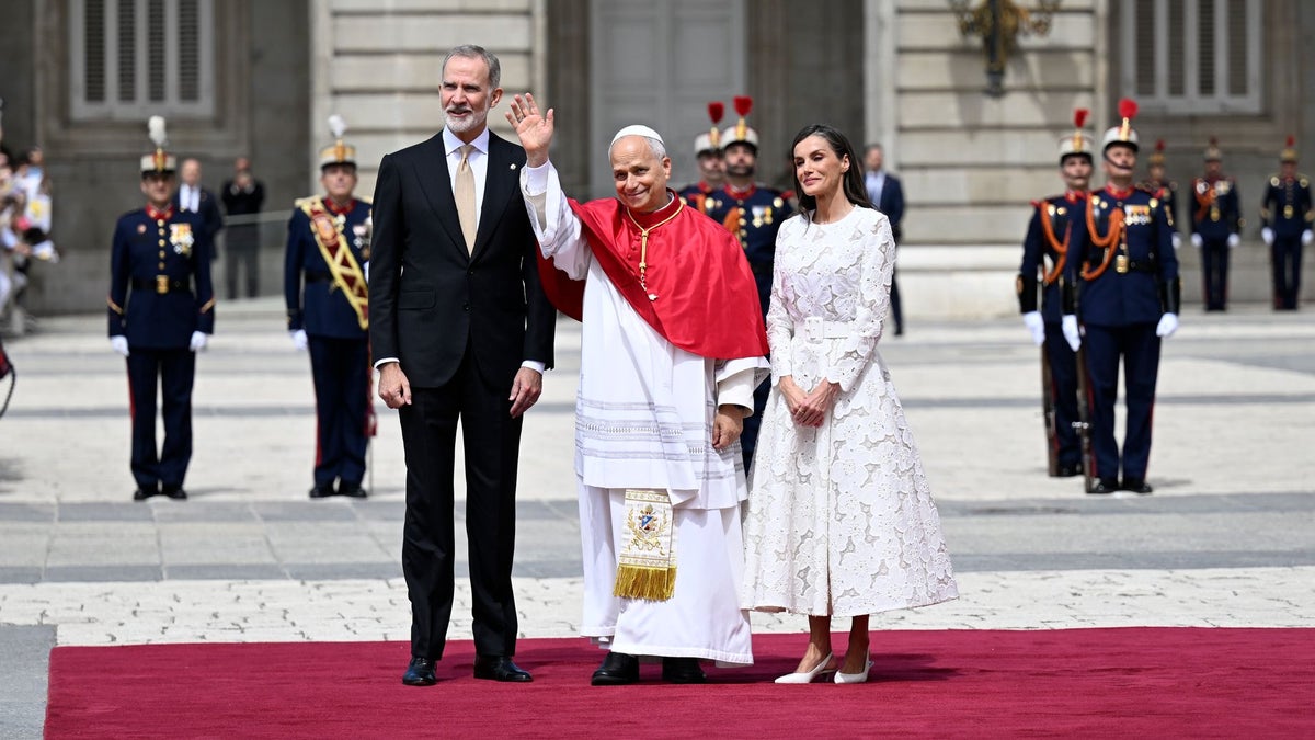 Queen Letizia honors Vatican tradition in a white lace dress for Pope Leo XIV