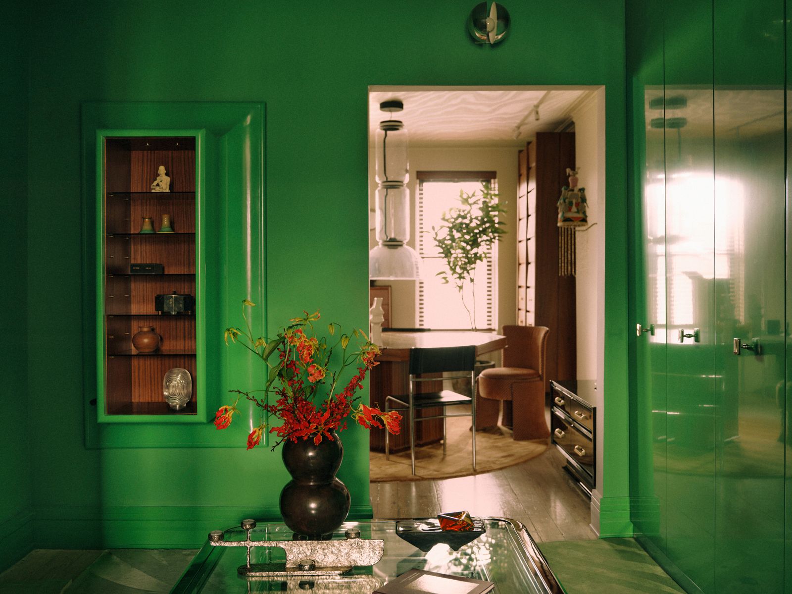 Image may contain Flower Flower Arrangement Plant Ikebana Indoors Interior Design Chair Furniture and Potted Plant