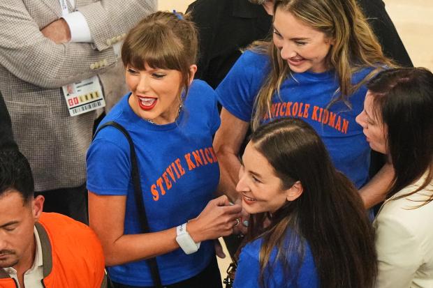 Taylor Swift, with Este Haim, center right back, and Alana Haim, center right front, arrives prior to Game 4 of the NBA Finals on June 10, 2026, in New York. (AP Photo/Frank Franklin II) 
