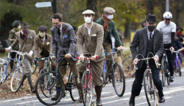 Participants in the 2020 Brooklyn Tweed Ride mount their bikes as they ride a loop in Prospect Park after a stop to sip champagne and tea at a colonnaded Grecian shelter, Sunday, Nov. 15, 2020. Photo: Kathy Willens/AP
