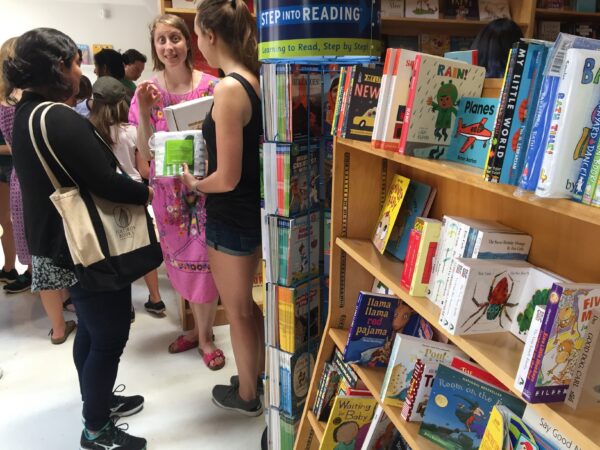 Author Emma Straub, center, chats with customers on the opening day for the new Books are Magic bookstore in Brooklyn, on April 29, 2017. Photo: Beth J. Harpaz/AP, File