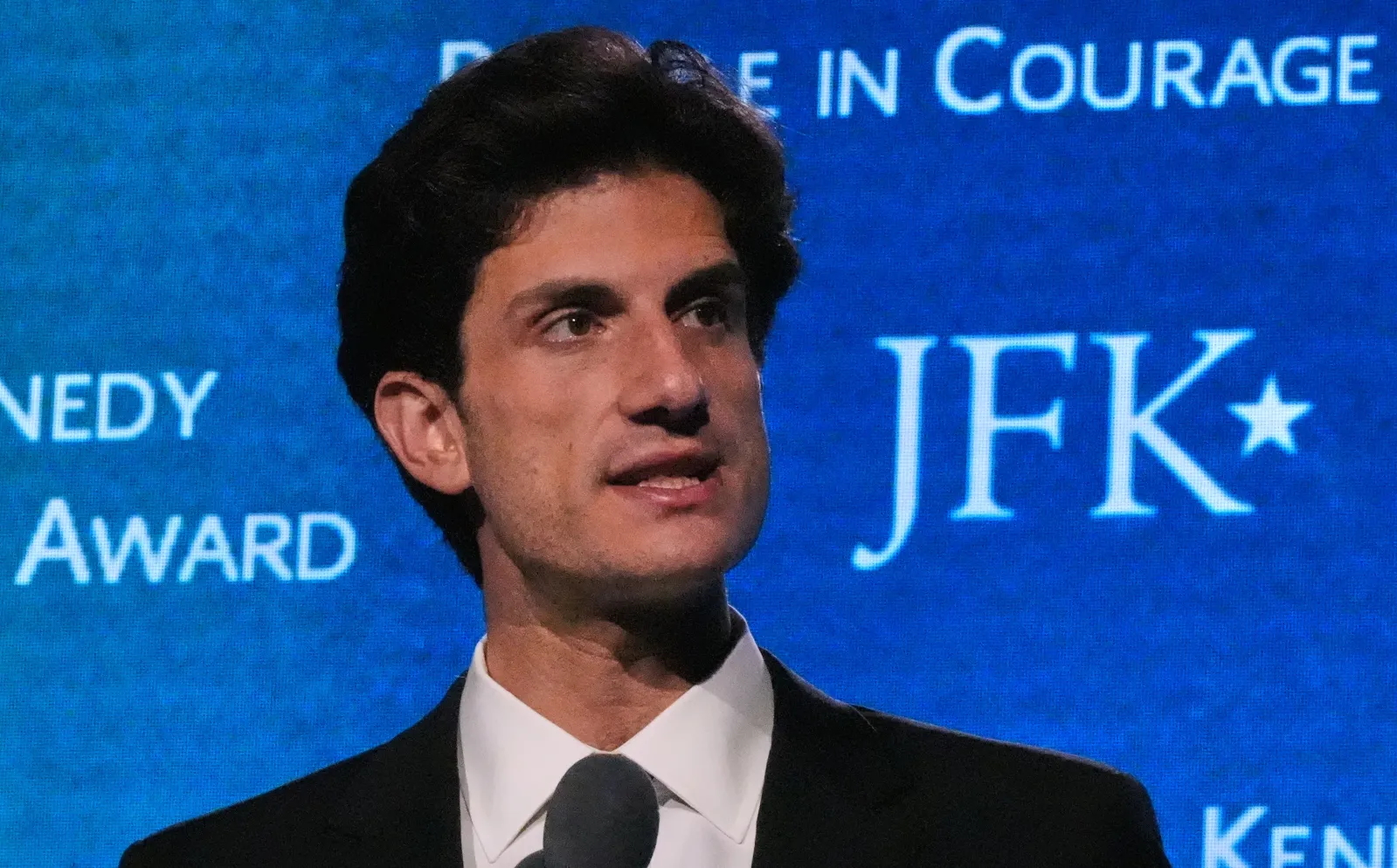 Jack Schlossberg, grandson of former President John F. Kennedy, addresses a gathering during the Profile in Courage Award ceremony at the John F. Kennedy Presidential Library on May 31, 2026, in Boston. (AP Photo/Charles Krupa)