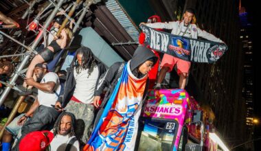 New York Knicks fans celebrate on the street outside of a watch party in Bryant Park for Game 3 of the NBA Finals basketball series between the Knicks and the San Antonio Spurs, Monday, June 8, 2026. (AP Photo/Ryan Murphy)