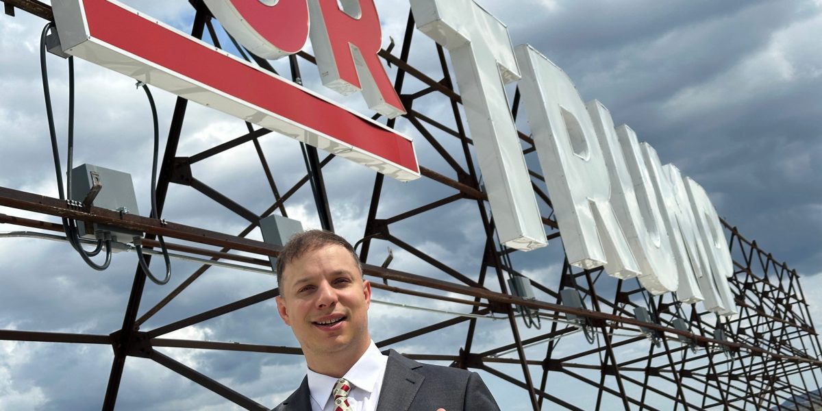 Upstate New York sticker mogul has a bronze Trump statue, MAGA hip-hop album and a presidential endorsement. The local machine wants the Marine