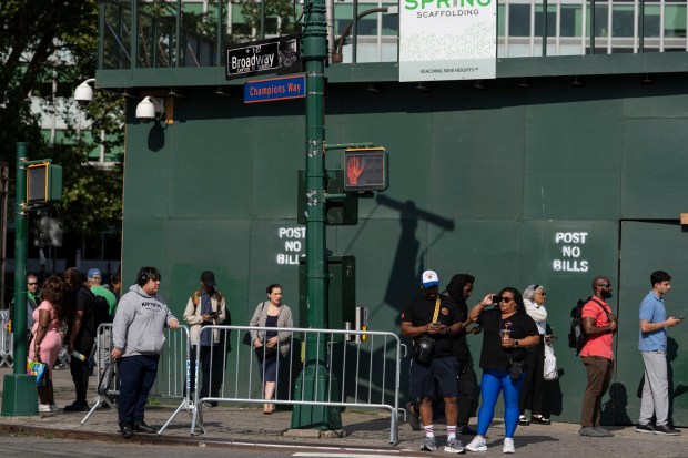 A street sign reading "Champions Way" is posted along Broadway known as the "Canyon of Heroes", ahead of the New York Knicks' ticker-tape parade, Wednesday, June 17, 2026, in New York. 
