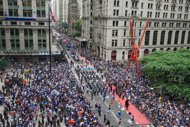 The NBA Champion New York Knicks ticker-tape parade on Broadway, in New York's "Canyon of Heroes," Thursday, June 18, 2026. (AP Photo/Richard Drew)