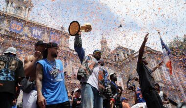 New York Knicks center Karl-Anthony Towns, center, celebrates with teammates during the New York Knicks' NBA championship parade Thursday, June 18, 2026, in New York. (AP Photo/Heather Khalifa)