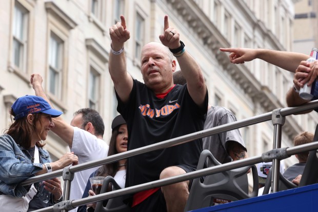 New York Knicks President of Basketball Operations Leon Rose celebrates the team's NBA championship during a ticker-tape parade down Lower Manhattan's "Canyon of Heroes" on Broadway, Thursday, June 18, 2026 in New York. This was the Knicks' first NBA championship in 53 years. (Jason DeCrow/Alliance for Downtown New York via AP Content Services)