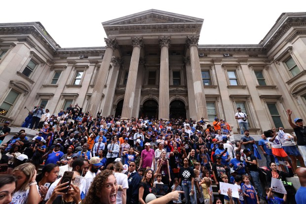 The New York Knicks celebrate their NBA championship during a ticker-tape parade down Lower Manhattan's "Canyon of Heroes" on Broadway, Thursday, June 18, 2026 in New York. This was the Knicks' first NBA championship in 53 years. (Jason DeCrow/Alliance for Downtown New York via AP Content Services)