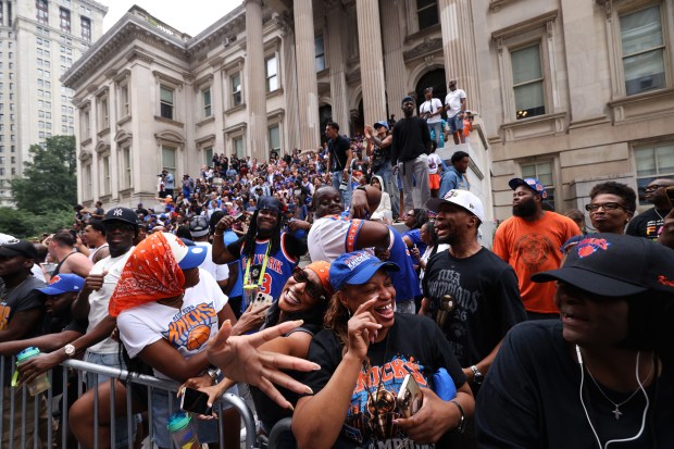 The New York Knicks celebrate their NBA championship during a ticker-tape parade down Lower Manhattan's "Canyon of Heroes" on Broadway, Thursday, June 18, 2026 in New York. This was the Knicks' first NBA championship in 53 years. (Jason DeCrow/Alliance for Downtown New York via AP Content Services)