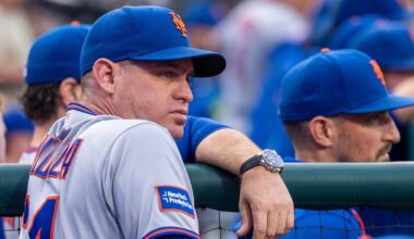 New York Mets manager Carlos Mendoza looks on during the first inning of a baseball game against the Philadelphia Phillies, Sunday, June 21, 2026, in Philadelphia.