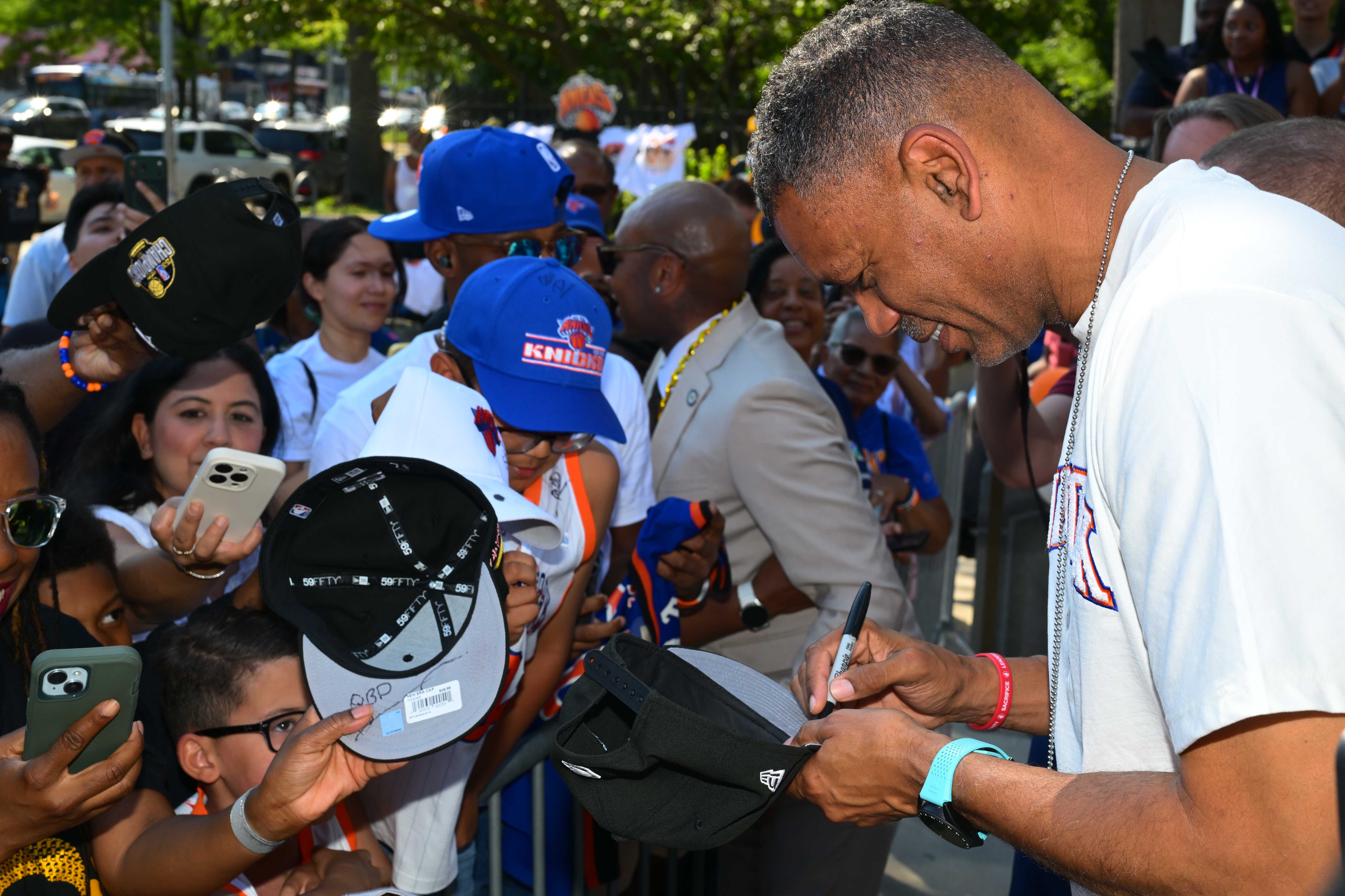 Allan Houston, a former Knicks player and two-time NBA All-Star, was invited to the Knicks Championship Rally and Flag Raising ceremony.