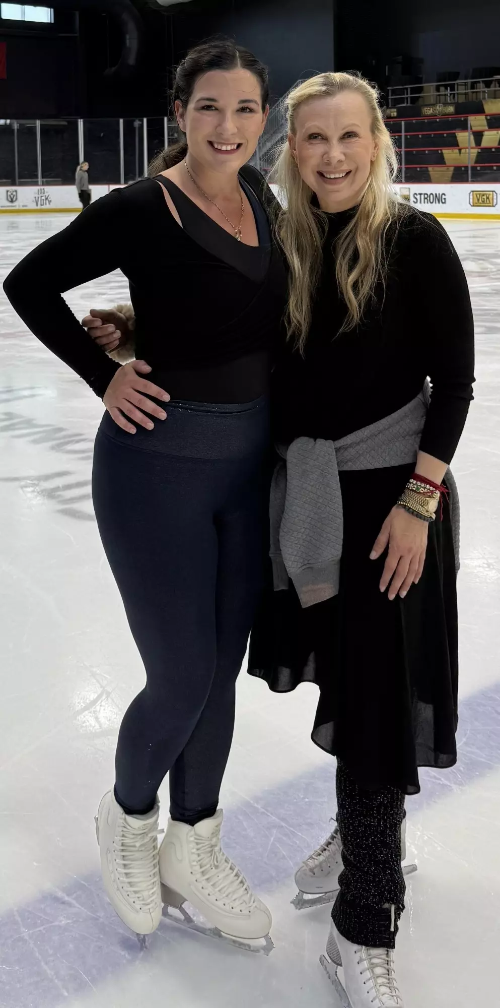 Baiul puts arm around adult skater Ashley Blount