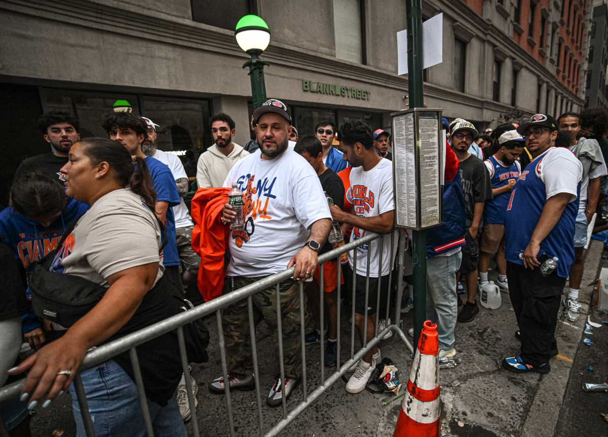 Knicks fans near subway entrance heading to ticker-tape parade