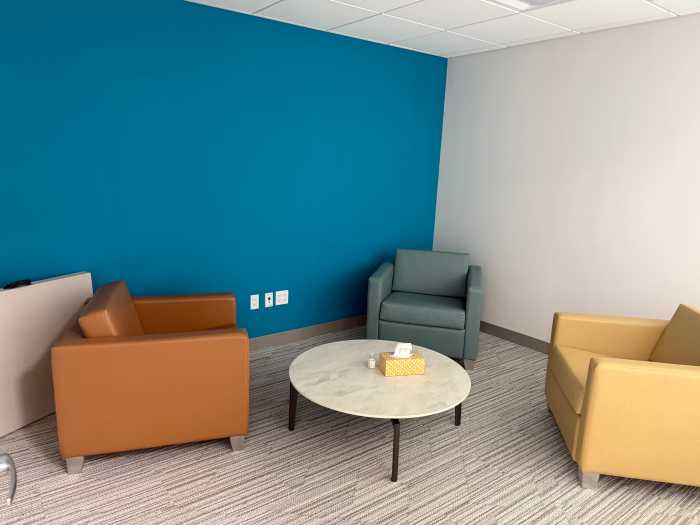 An interview room at the new Bronx SVU facility offers a calmer atmosphere than traditional NYPD precincts, with comfortable chairs and privacy for survivors to report or speak with advocates.
